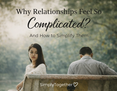 A couple sitting apart on a park bench, looking away from each other, representing emotional distance and complicated relationships.